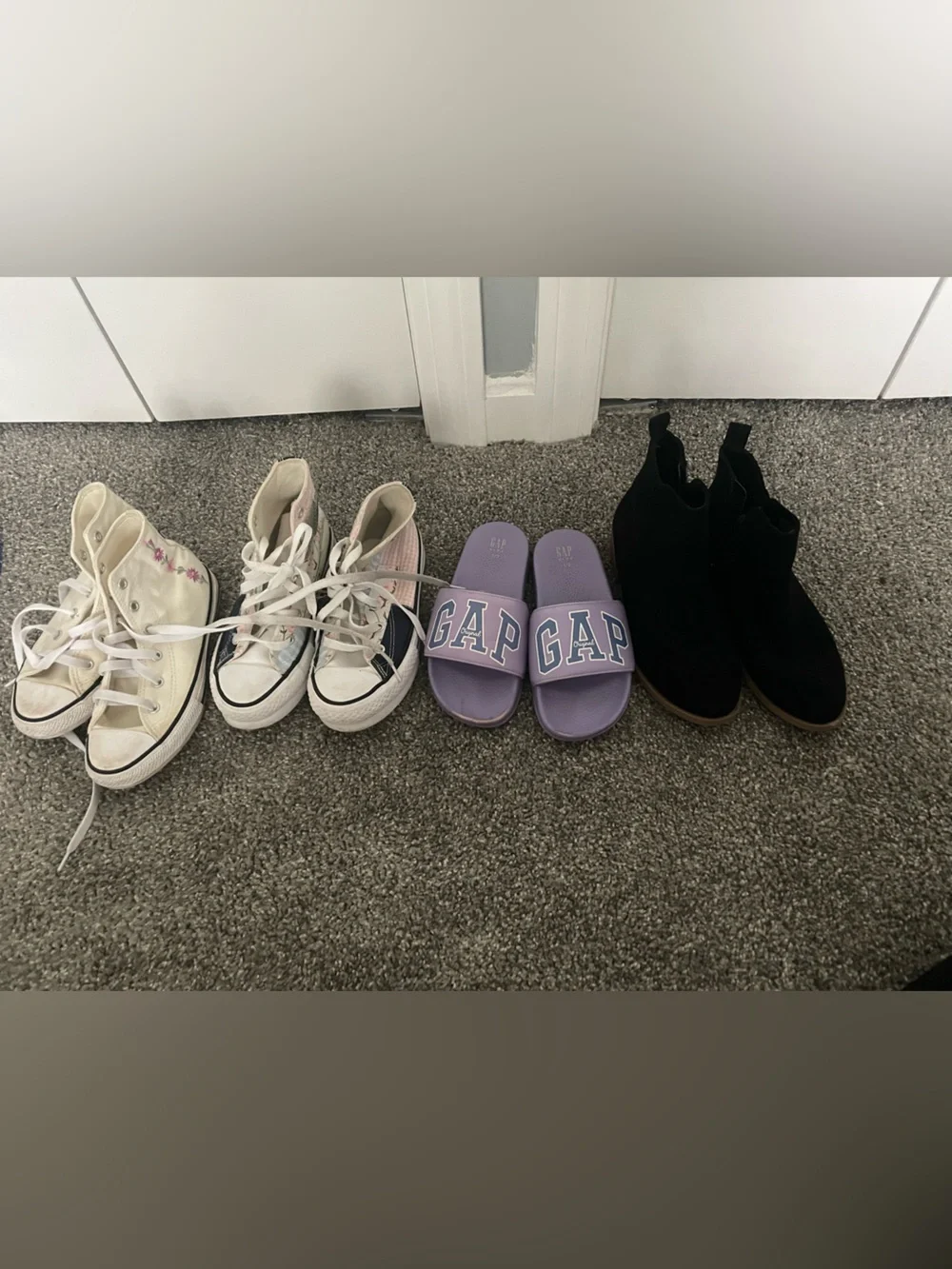 Lot of converse sneakers/ gap slides/ black boots